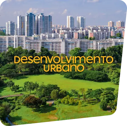 Imagem aérea com vista de fundo de prédios e na frente uma ampla área verde de um parque no centro da smart cidade. 